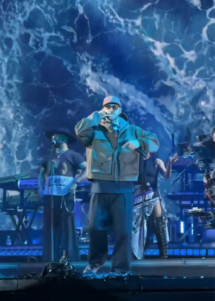 Justin Timberlake performing on stage with backup singers during a Romania show caught in a viral embarrassing moment.