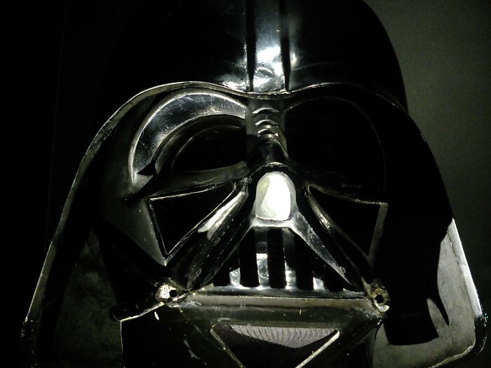 Close-up of a high-value collectible Darth Vader helmet sold as one of the highest-value collectible items.