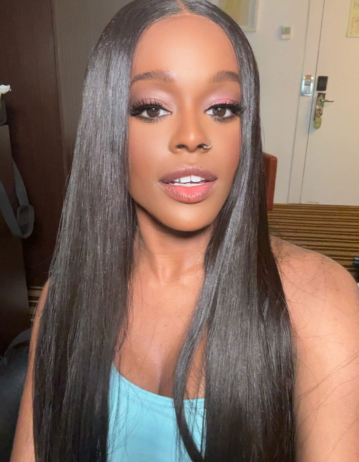 Woman with long straight hair and nose ring taking a selfie indoors, related to Conor McGregor leaked x-rated pic news.