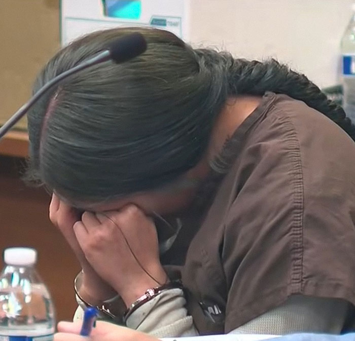 Woman in court sobbing with head in hands after baby lost his life in car during mom’s lip filler appointment. - 5