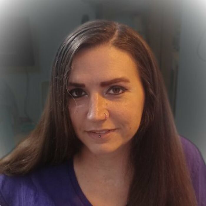 Paralyzed woman smiling in a casual setting, illustrating the impact of Elon Musk's Neuralink brain chip technology. - 1