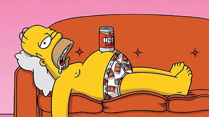Homer Simpson lying on a couch with drool and a beer can, illustrating bizarre facts about countries.