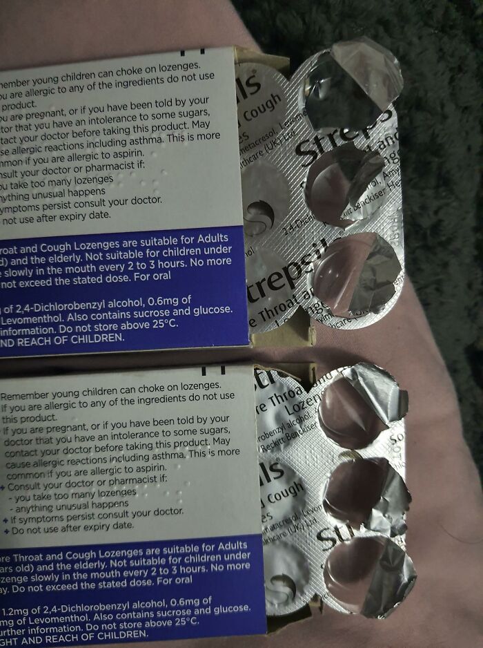Two identical cough lozenge packets, one with pills inside and one missing pills, showing a real-life glitch.
