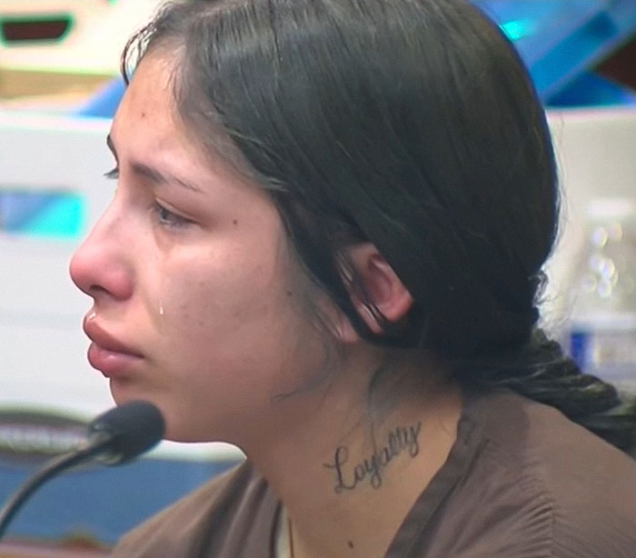 Woman with tear-streaked face and loyalty tattoo on neck sobbing in court over tougher charges after baby lost life in car. - 4