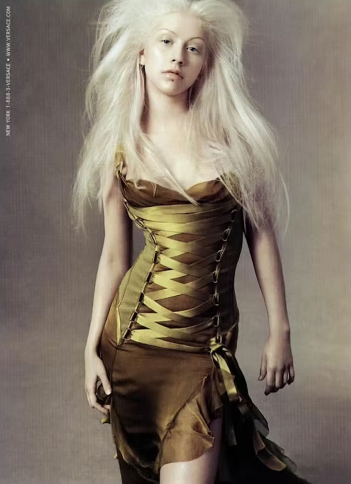 Christina Aguilera in a green corset dress with voluminous blonde hair sparking health concerns during latest public appearance Christina Aguilera in a green corset dress with voluminous blonde hair sparking health concerns during latest public appearance