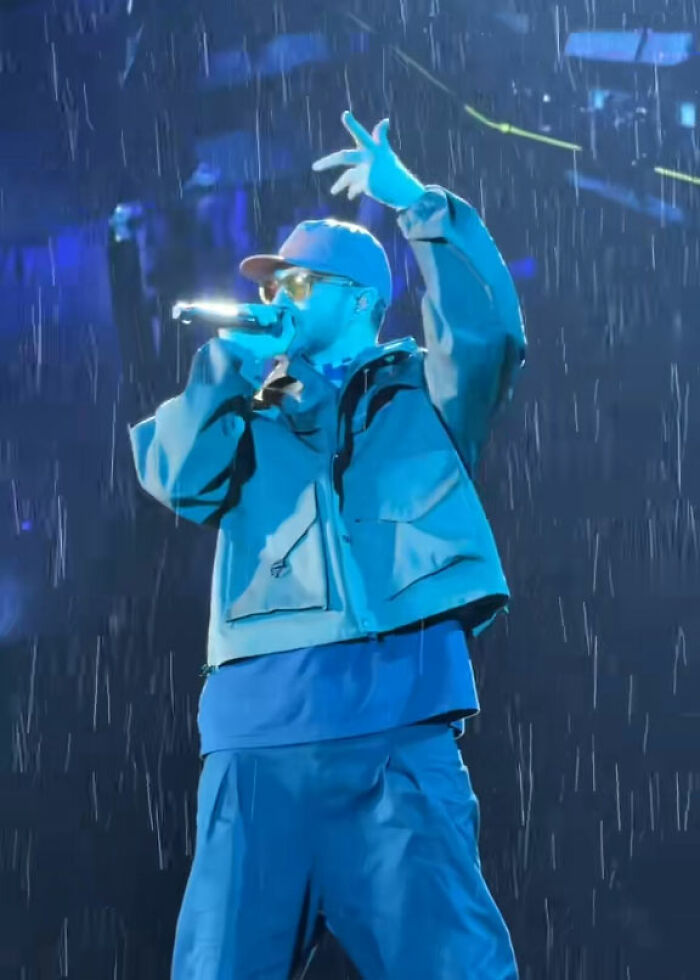 Justin Timberlake performing in the rain during Romania show, which went viral as fans demand a refund.