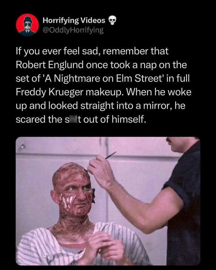 Actor in full Freddy Krueger makeup during a makeup session, showing an unnerving and horrifying transformation.