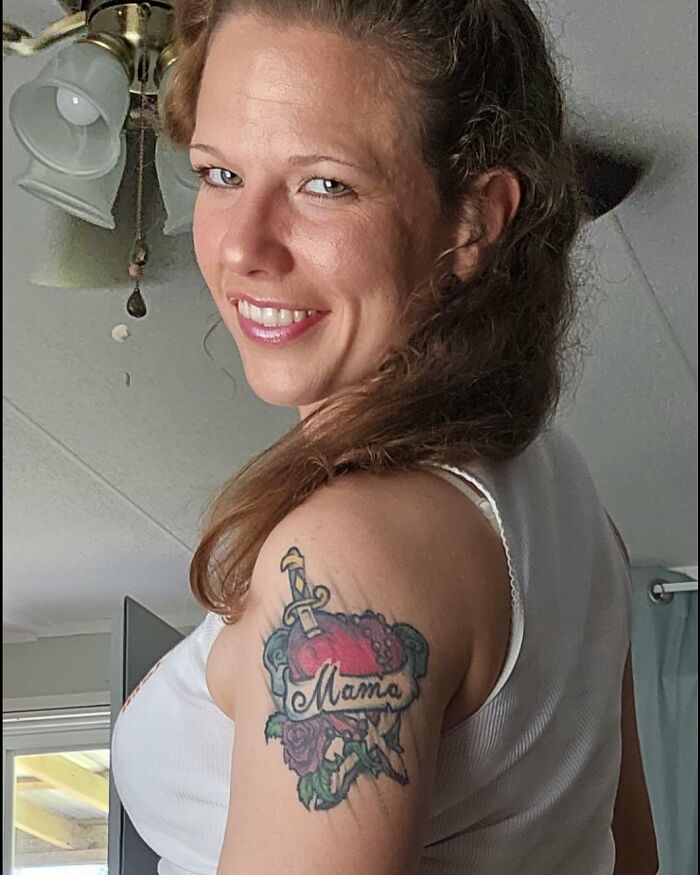 Smiling woman with a "Mama" tattoo on her arm, linked to woman mysteriously vanished in Death Valley found. Smiling woman with a "Mama" tattoo on her arm, linked to woman mysteriously vanished in Death Valley found.