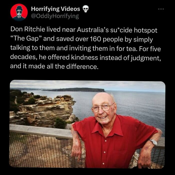 Elderly man smiling near a cliff at Australia's "The Gap," highlighting kindness in an oddly horrifying and unnerving context.