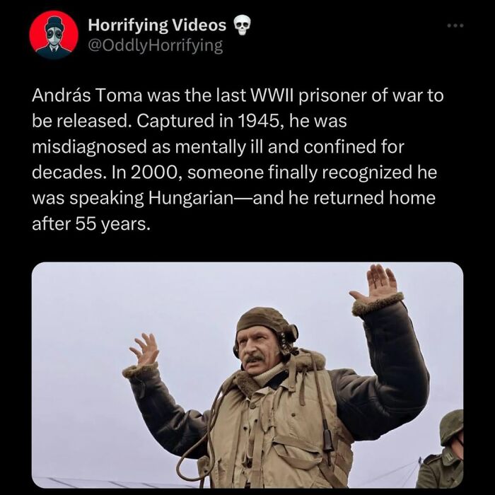 Man in vintage military gear raising hands, illustrating an unnerving story from oddly horrifying images collection.