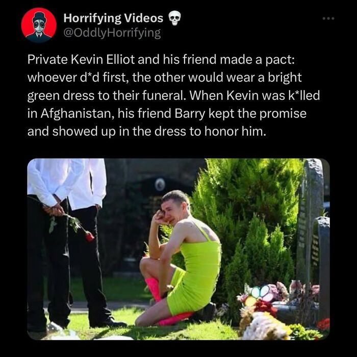 Man in bright green dress at a grave, honoring a fallen friend, an oddly horrifying and unnerving scene.