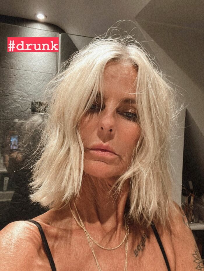 Ulrika Jonsson with over-tanned face and blonde hair in an emotional post addressing online trolls.