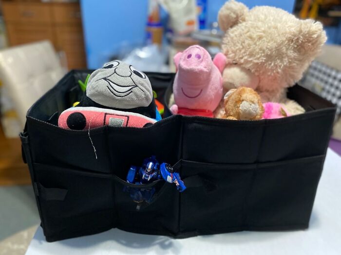 Black organizer filled with various plush toys and action figures, one of the most wished for items burning up Amazon.