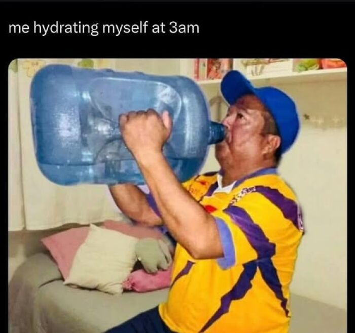 Man in a colorful jersey drinking from a large water container, representing funny memes about being Hispanic at 3am hydration.