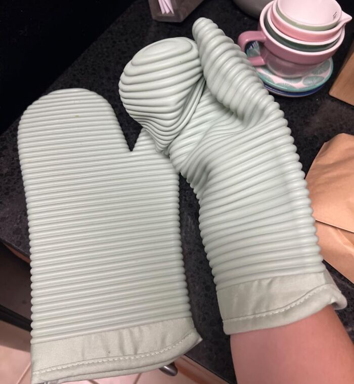 Silicone ribbed oven mitts in light gray shown on countertop and worn on a hand, highlighting Prime Day finds.