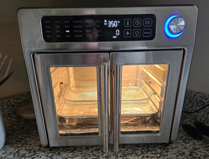 Stainless steel air fryer oven with dual doors and digital controls, one of the 5-star Prime Day finds.