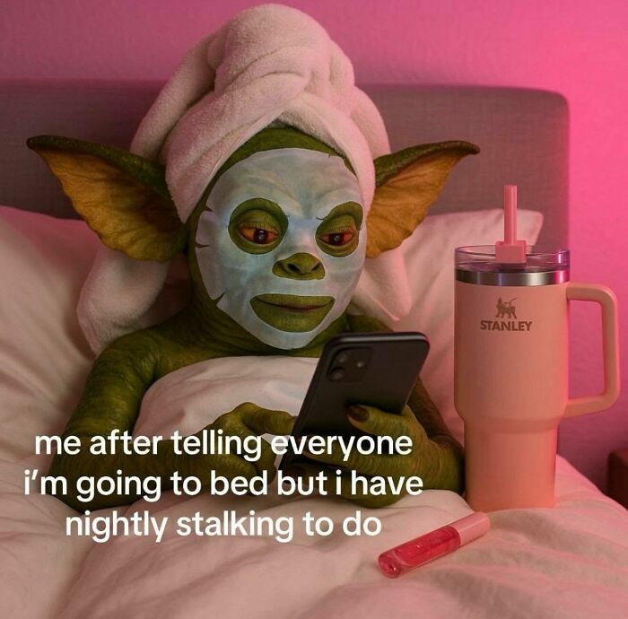 Grogu relaxing in bed with a face mask and towel, holding a phone, depicting a funny relatable moment for girly women.