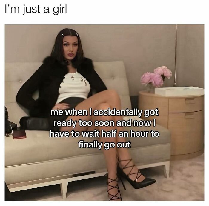 Young woman sitting on couch wearing black heels and outfit, funny and relatable memes for girly women about waiting to go out.
