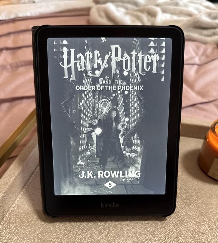 Kindle displaying Harry Potter ebook on a tray, showcasing popular Prime Day electronic deals for avid readers and shoppers.