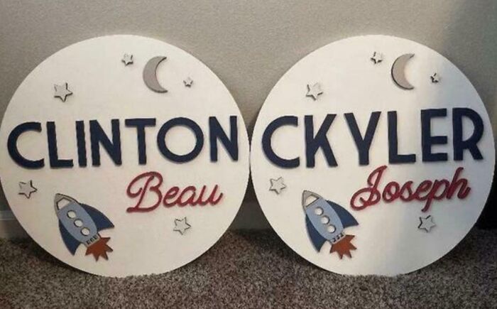 Two round nursery name signs featuring unique baby names Clinton Beau and Ckyler Joseph with space-themed decorations.