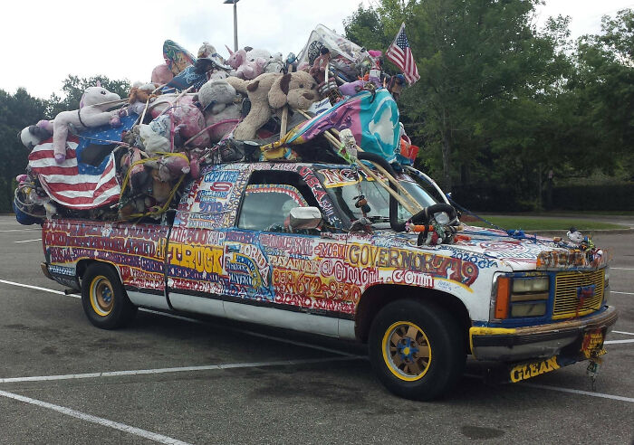 Pickup truck covered in colorful text and stuffed animals among outrageous car mods that took customization too far.
