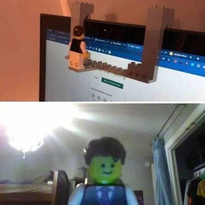 LEGO figure hanging on computer screen with a smiling LEGO person in a brightly lit room, blessed images to make you smile.