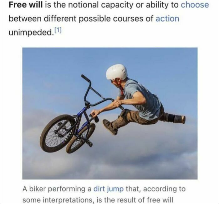 Biker with a prosthetic leg performing a high dirt jump, illustrating strength and determination in blessed images.
