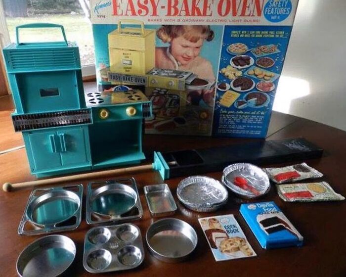 Vintage Easy-Bake Oven toy with baking pans, accessories, and original packaging showcasing vintage things collection.