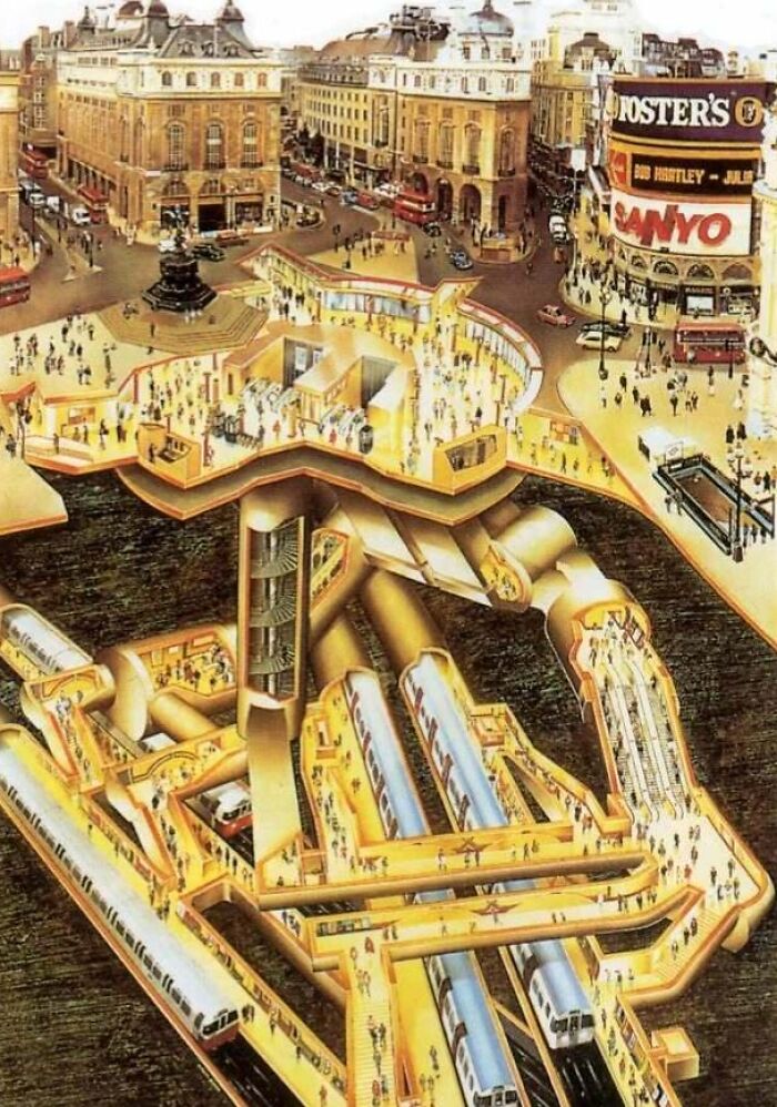 Cutaway infographic showing an underground metro station beneath a busy city square with detailed infrastructure and crowds.