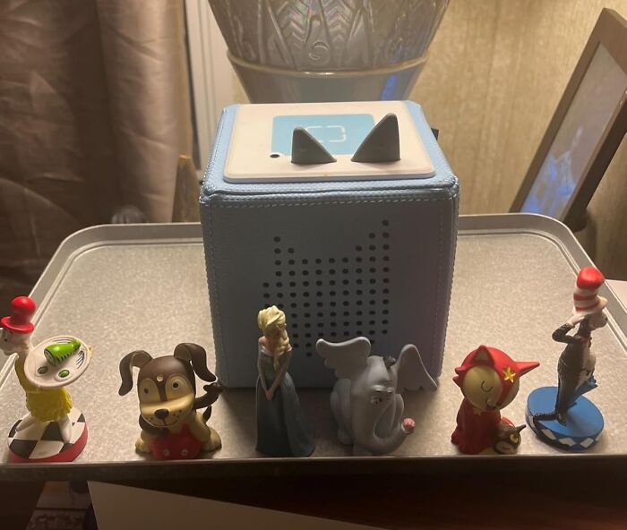 Children's toys displayed next to a kid-friendly speaker, highlighting unique Prime Day treasures for gift ideas.