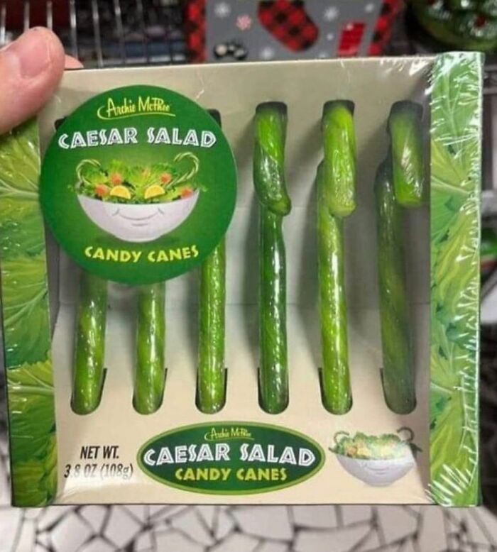 Packaging of Caesar salad candy canes with a weird green appearance in cursed pictures of food.