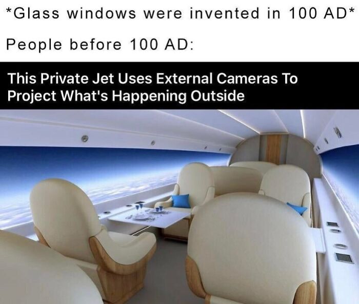 Private jet interior with external cameras projecting outside views, a funny and random meme about modern tech and history.