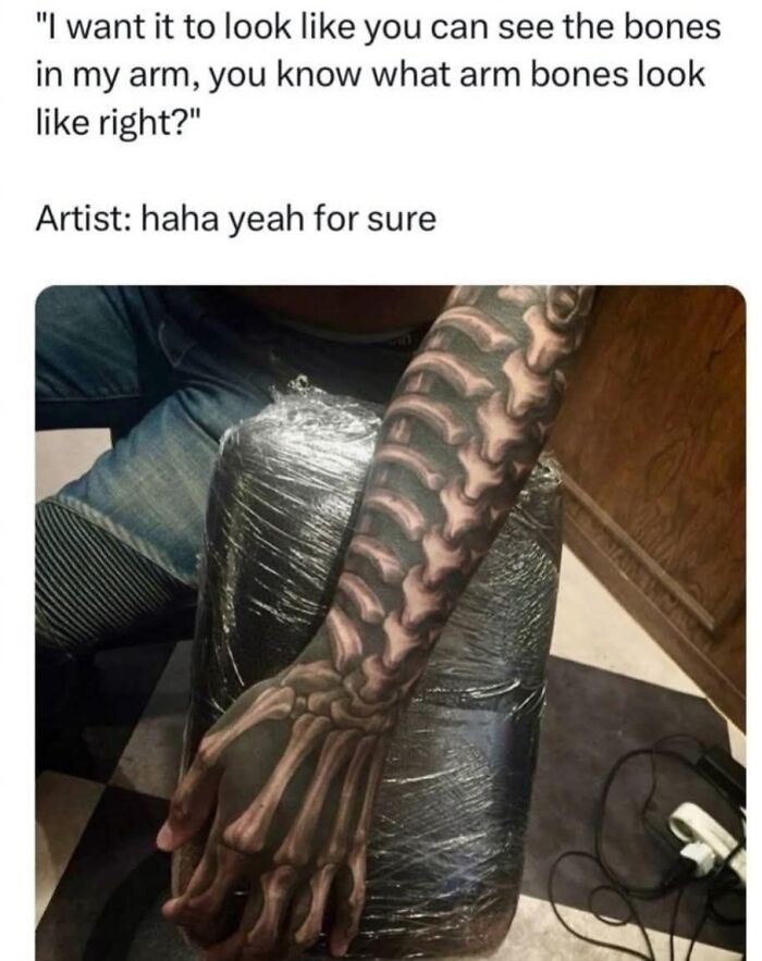 Arm tattoo intended to show bones with a poorly executed design, featured in horrible crafts shamed by netizens.