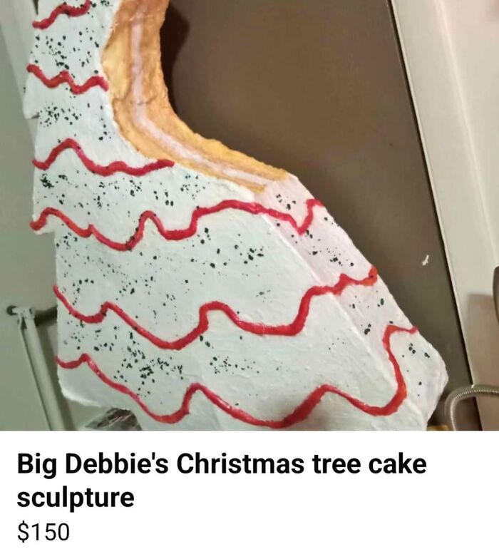 Poorly made Christmas tree cake sculpture with uneven icing and messy decoration, showcasing horrible crafts from netizens.