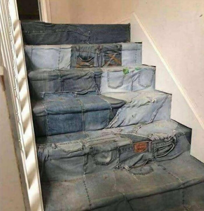 Stairs covered with patches of denim fabric resembling jeans, showcasing a horrible craft attempt by netizens.