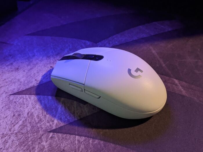 Wireless computer mouse on a textured surface highlighting back-to-school deals for Prime Day essentials and accessories.