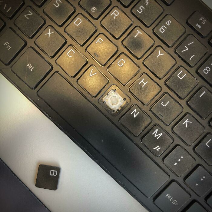 Close-up of a keyboard with a missing B key, illustrating an epic work fail involving computer equipment.