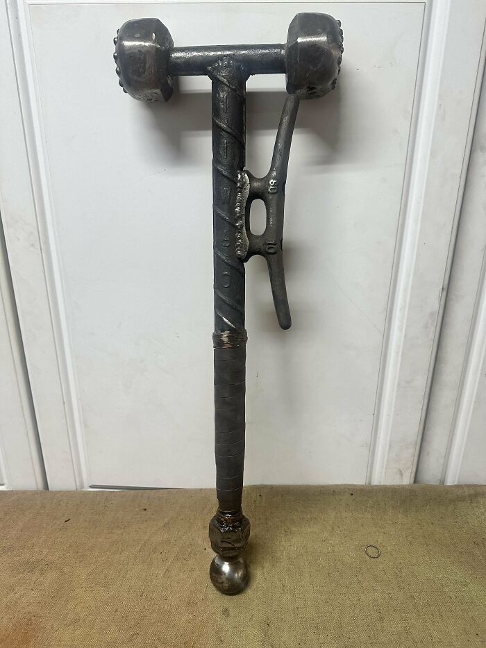 Homemade tool crafted with metal parts showcasing redneck engineering and creative MacGyvering skills.
