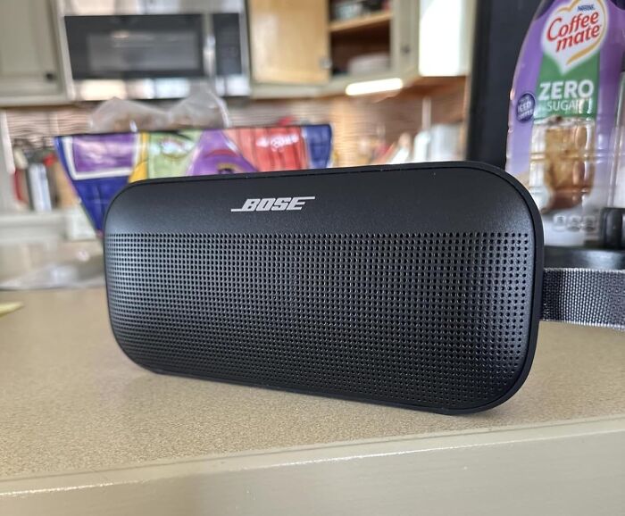 Portable Bose speaker on a kitchen counter illustrating back-to-school deals for Prime Day syllabuses and essentials.