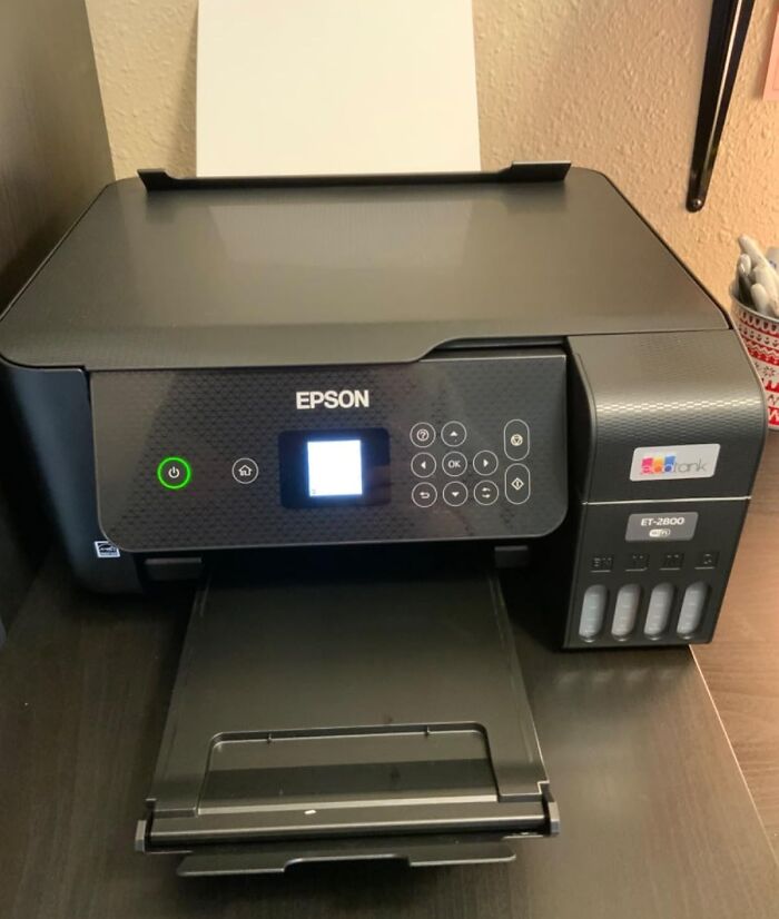 Epson printer on a desk ready for printing syllabuses and back-to-school deals during Prime Day event.