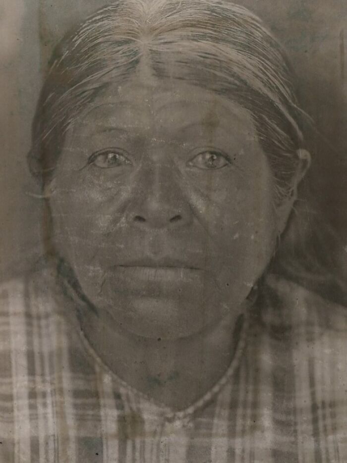Portrait of an elderly Native American woman captured in a powerful Edward S. Curtis photo preserving history.