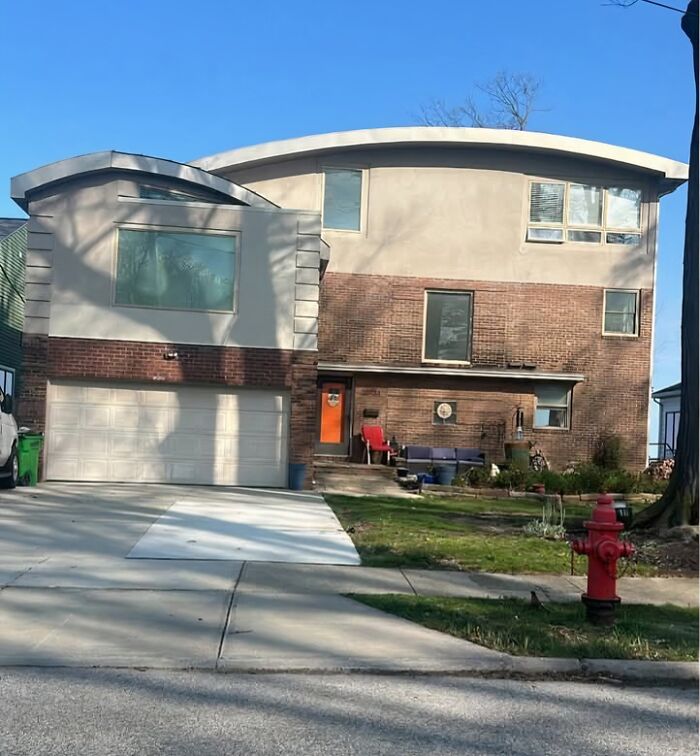 Modern home with mismatched design elements and awkward architectural features, showcasing a creative home design fail.