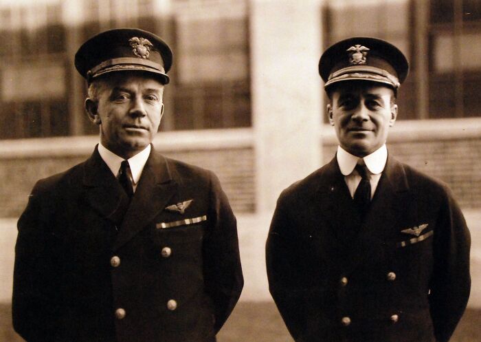 Two men in 1920s military uniforms posing outdoors in a vintage photo of Washington, D.C. history.