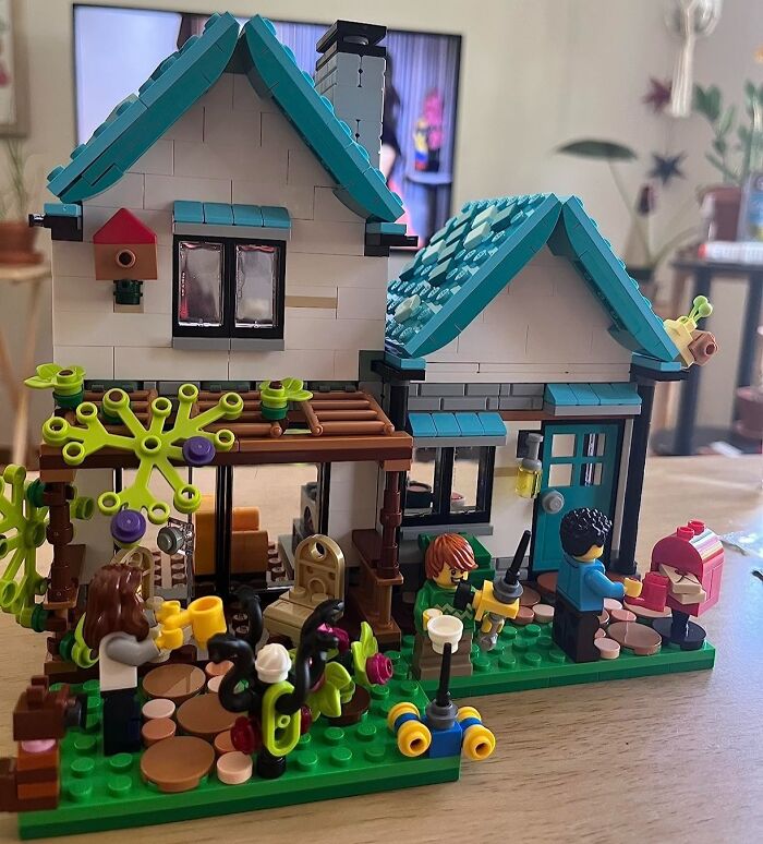 LEGO house set with mini-figures and plants, showcasing popular brands during Prime Day deals event.