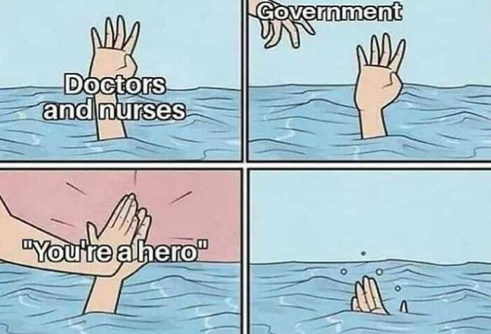 Medical meme showing doctors and nurses drowning while government offers a high five calling them heroes, highlighting healthcare costs.