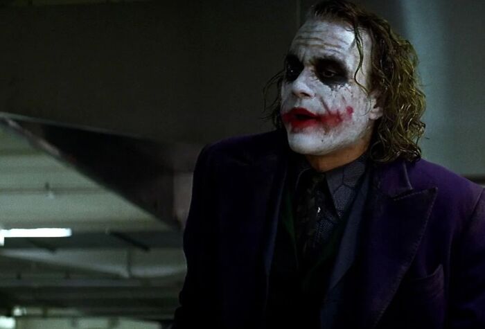 Heath Ledger as iconic villain Joker in dark setting, representing actors who auditioned for Heroes but became villains instead.