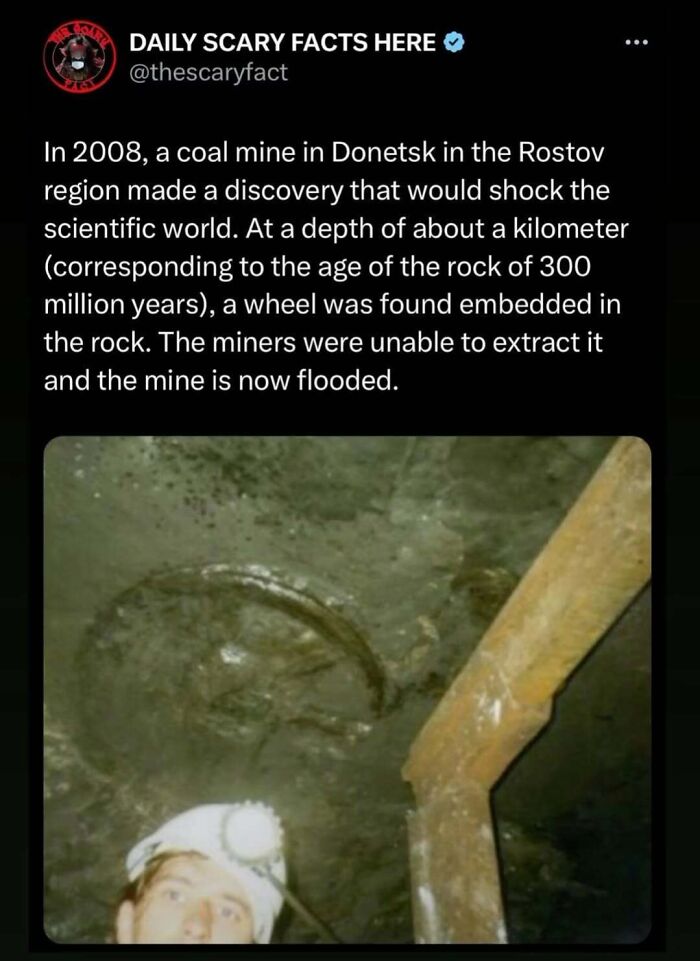 Coal mine discovery with an ancient wheel embedded in rock, illustrating scary facts to scroll through in the darkness.