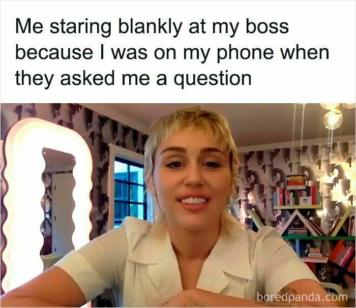 Person in casual clothes staring blankly during a video call, capturing a relatable moment from funny WFH memes.