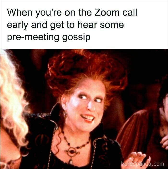 Woman with red hair looking excited during a Zoom call, depicting funny WFH meme about pre-meeting gossip.