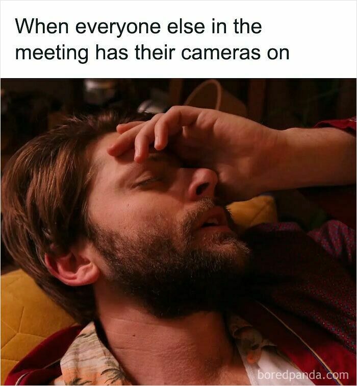 Man wiping forehead in frustration during a virtual meeting, capturing the humor of funny WFH memes about remote work struggles.